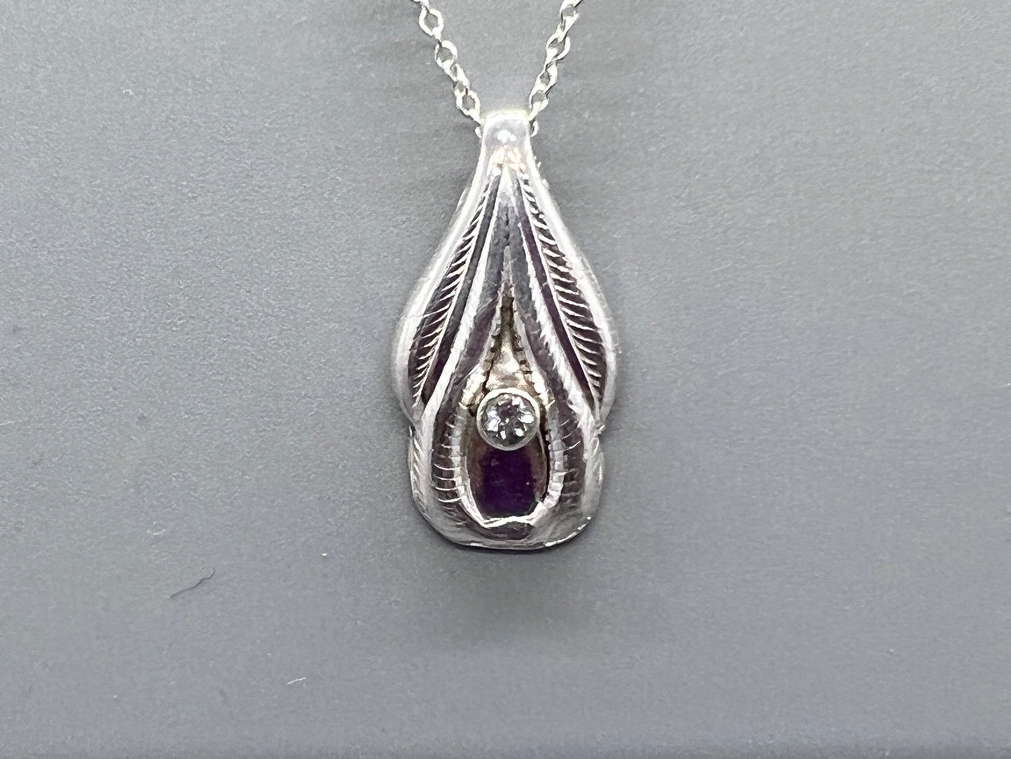 Art deco bracelet link with a strategically placed moissanite to resemble labia lips and the clitoris location.