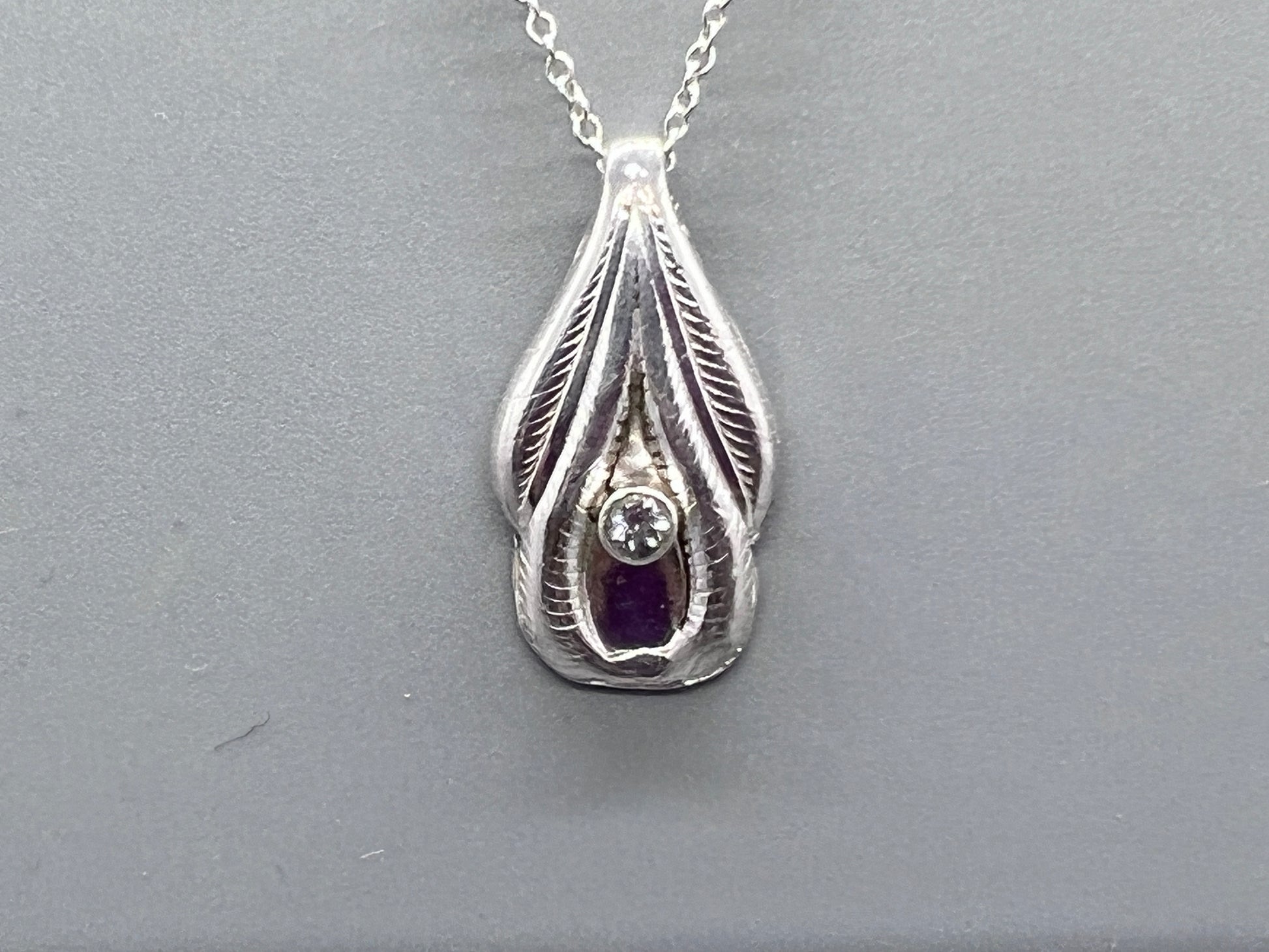 Art deco bracelet link with a strategically placed moissanite to resemble labia lips and the clitoris location.